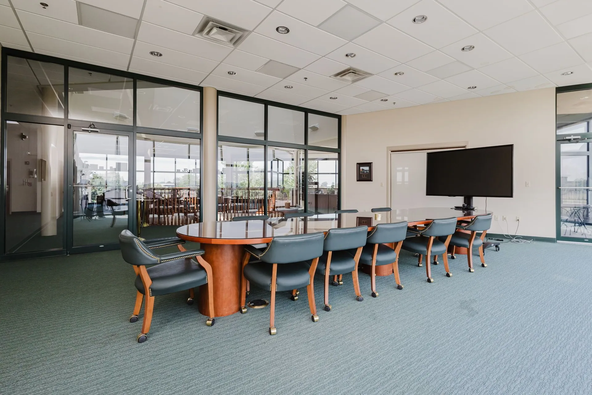 Board Room with a long conference table set for a meeting